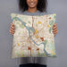 Person holding 18x18 Custom Cedar Rapids Iowa Map Throw Pillow in Woodblock