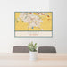 24x36 Ceres California Map Print Lanscape Orientation in Woodblock Style Behind 2 Chairs Table and Potted Plant