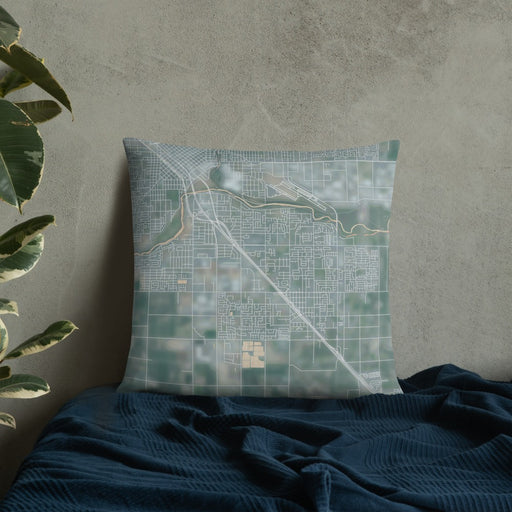 Custom Ceres California Map Throw Pillow in Afternoon on Bedding Against Wall