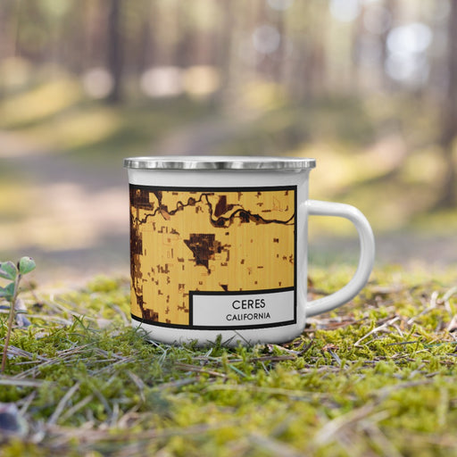 Right View Custom Ceres California Map Enamel Mug in Ember on Grass With Trees in Background