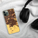 Custom Ceres California Map Phone Case in Ember on Table with Black Headphones