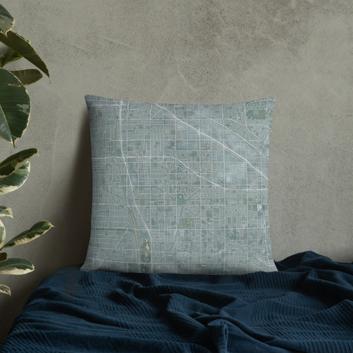 Custom Cerritos California Map Throw Pillow in Afternoon on Bedding Against Wall