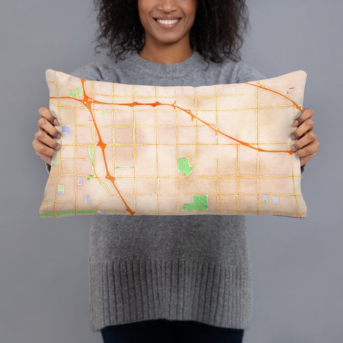 Person holding 20x12 Custom Cerritos California Map Throw Pillow in Watercolor