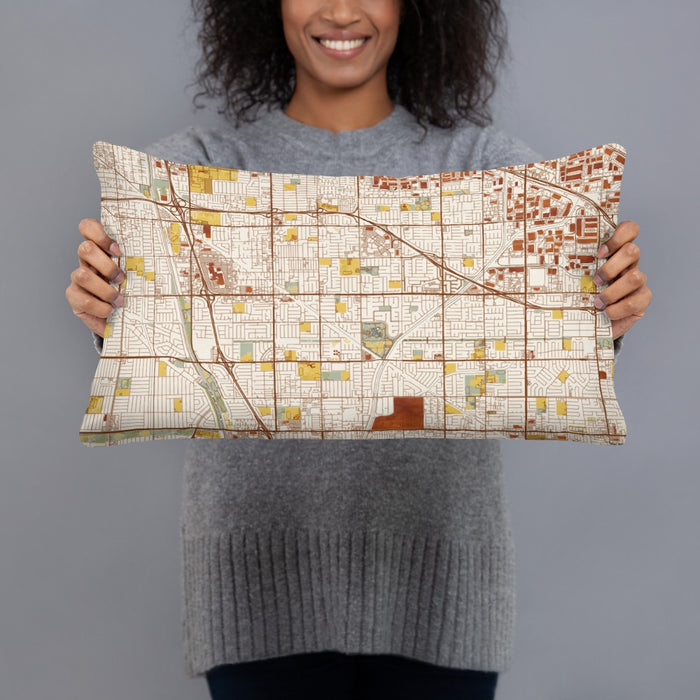 Person holding 20x12 Custom Cerritos California Map Throw Pillow in Woodblock