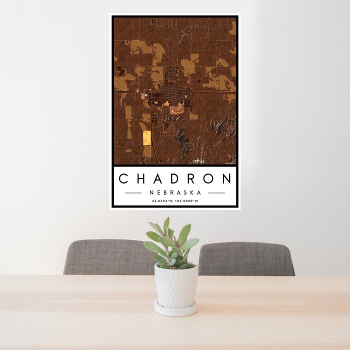 24x36 Chadron Nebraska Map Print Portrait Orientation in Ember Style Behind 2 Chairs Table and Potted Plant