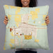 Person holding 22x22 Custom Chadron Nebraska Map Throw Pillow in Woodblock