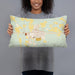 Person holding 20x12 Custom Chadron Nebraska Map Throw Pillow in Woodblock
