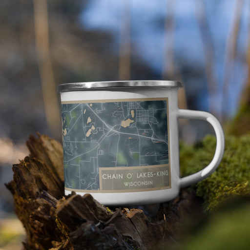 Right View Custom Chain O' Lakes-King Wisconsin Map Enamel Mug in Afternoon on Grass With Trees in Background