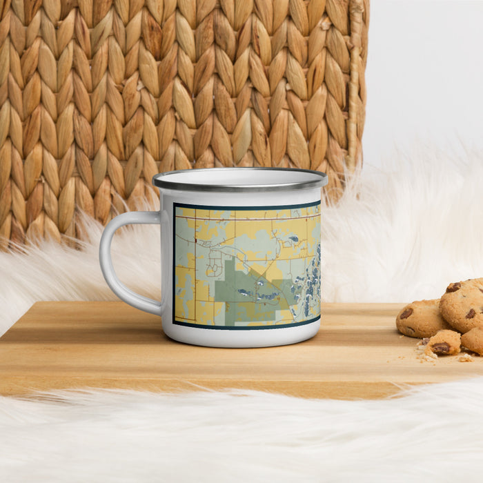 Left View Custom Chain O' Lakes-King Wisconsin Map Enamel Mug in Woodblock on Table Top