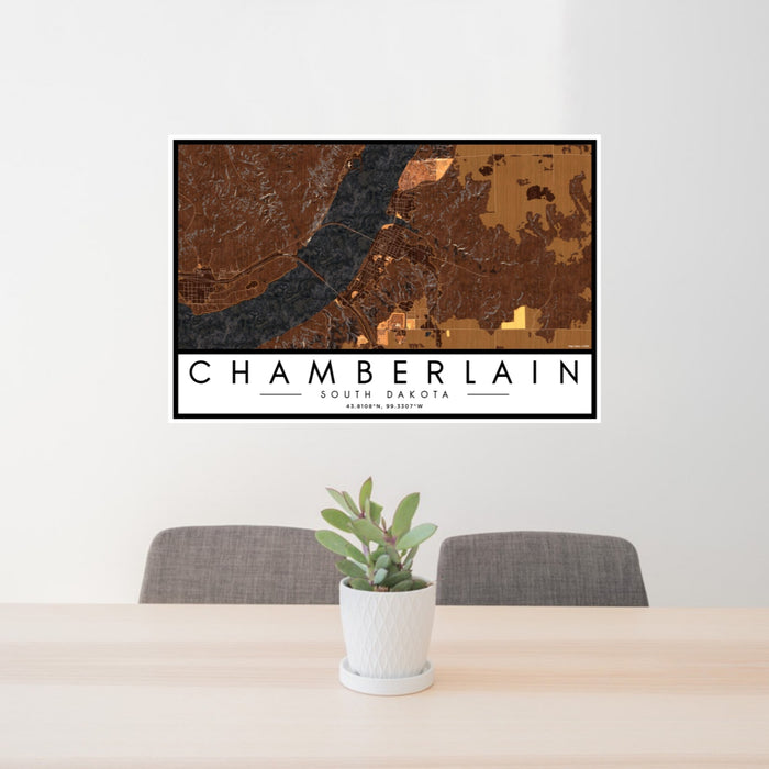 24x36 Chamberlain South Dakota Map Print Landscape Orientation in Ember Style Behind 2 Chairs Table and Potted Plant