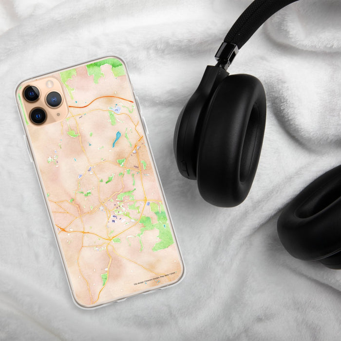 Custom Chapel Hill North Carolina Map Phone Case in Watercolor on Table with Black Headphones