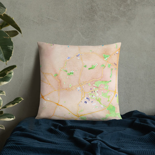 Custom Chapel Hill North Carolina Map Throw Pillow in Watercolor on Bedding Against Wall