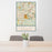 24x36 Chapel Hill North Carolina Map Print Portrait Orientation in Woodblock Style Behind 2 Chairs Table and Potted Plant