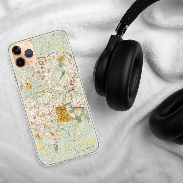 Custom Chapel Hill North Carolina Map Phone Case in Woodblock on Table with Black Headphones