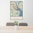 24x36 Charleston South Carolina Map Print Portrait Orientation in Woodblock Style Behind 2 Chairs Table and Potted Plant
