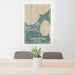 24x36 Charlevoix Michigan Map Print Portrait Orientation in Afternoon Style Behind 2 Chairs Table and Potted Plant