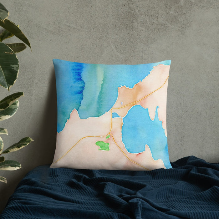 Custom Charlevoix Michigan Map Throw Pillow in Watercolor on Bedding Against Wall