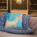 Custom Charlevoix Michigan Map Throw Pillow in Watercolor on Cream Colored Couch
