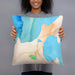 Person holding 18x18 Custom Charlevoix Michigan Map Throw Pillow in Watercolor