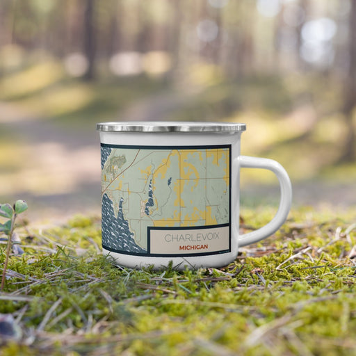 Right View Custom Charlevoix Michigan Map Enamel Mug in Woodblock on Grass With Trees in Background