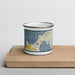 Front View Custom Charlevoix Michigan Map Enamel Mug in Woodblock on Cutting Board
