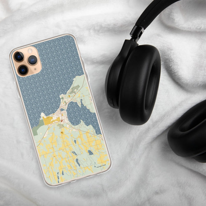 Custom Charlevoix Michigan Map Phone Case in Woodblock on Table with Black Headphones