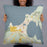 Person holding 22x22 Custom Charlevoix Michigan Map Throw Pillow in Woodblock