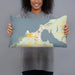 Person holding 20x12 Custom Charlevoix Michigan Map Throw Pillow in Woodblock