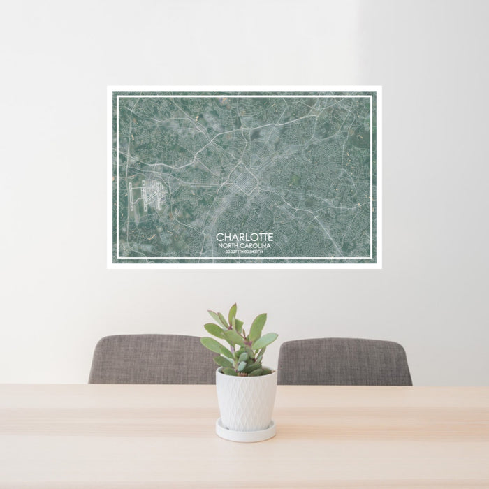 24x36 Charlotte North Carolina Map Print Lanscape Orientation in Afternoon Style Behind 2 Chairs Table and Potted Plant