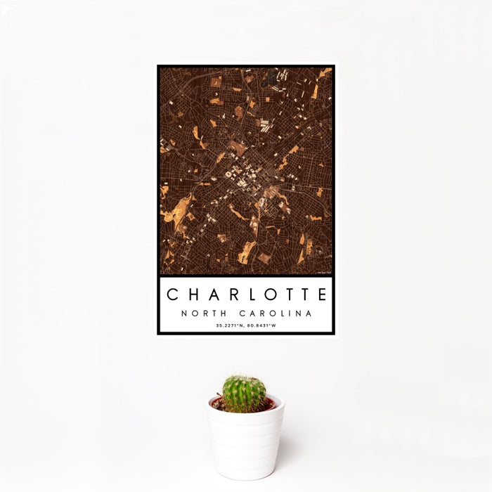 12x18 Charlotte North Carolina Map Print Portrait Orientation in Ember Style With Small Cactus Plant in White Planter