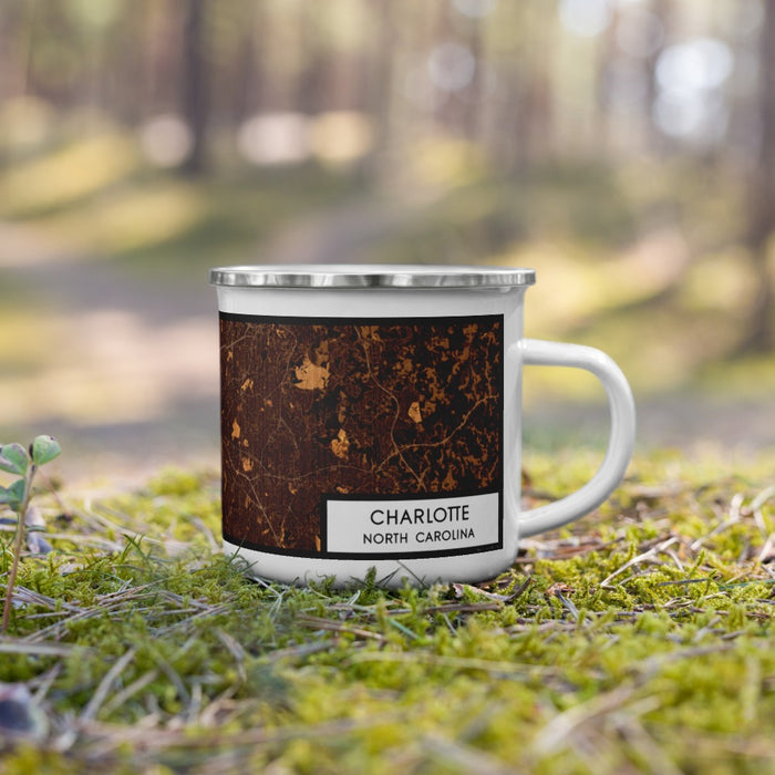 Right View Custom Charlotte North Carolina Map Enamel Mug in Ember on Grass With Trees in Background