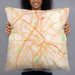Person holding 22x22 Custom Charlotte North Carolina Map Throw Pillow in Watercolor
