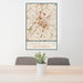 24x36 Charlotte North Carolina Map Print Portrait Orientation in Woodblock Style Behind 2 Chairs Table and Potted Plant