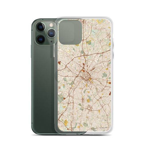 Custom Charlotte North Carolina Map Phone Case in Woodblock on Table with Laptop and Plant