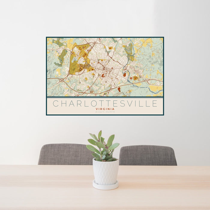 24x36 Charlottesville Virginia Map Print Landscape Orientation in Woodblock Style Behind 2 Chairs Table and Potted Plant