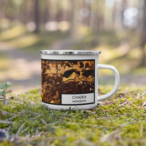 Right View Custom Chaska Minnesota Map Enamel Mug in Ember on Grass With Trees in Background