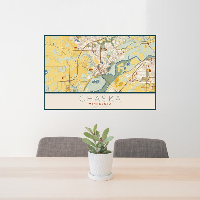 24x36 Chaska Minnesota Map Print Landscape Orientation in Woodblock Style Behind 2 Chairs Table and Potted Plant
