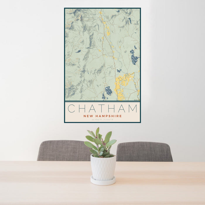 24x36 Chatham New Hampshire Map Print Portrait Orientation in Woodblock Style Behind 2 Chairs Table and Potted Plant