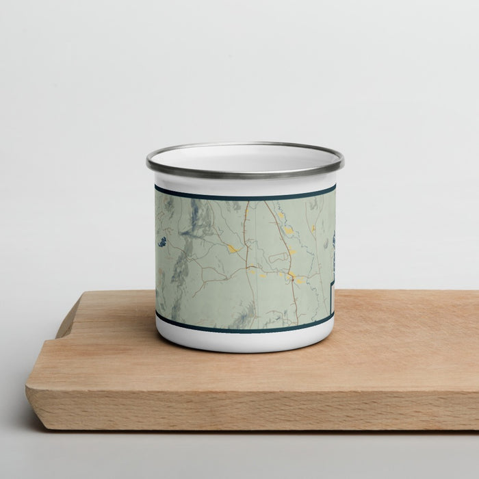 Front View Custom Chatham New Hampshire Map Enamel Mug in Woodblock on Cutting Board