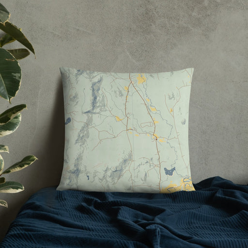 Custom Chatham New Hampshire Map Throw Pillow in Woodblock on Bedding Against Wall