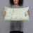 Person holding 20x12 Custom Chatham New Hampshire Map Throw Pillow in Woodblock