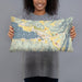 Person holding 20x12 Custom Chelan Washington Map Throw Pillow in Woodblock