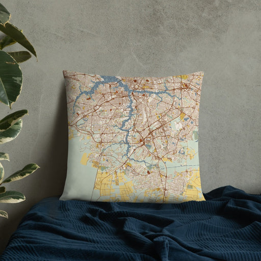 Custom Chesapeake Virginia Map Throw Pillow in Woodblock on Bedding Against Wall