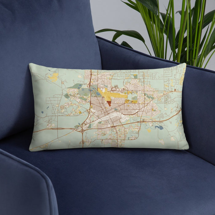 Custom Cheyenne Wyoming Map Throw Pillow in Woodblock on Blue Colored Chair