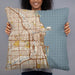 Person holding 22x22 Custom Chicago Illinois Map Throw Pillow in Woodblock