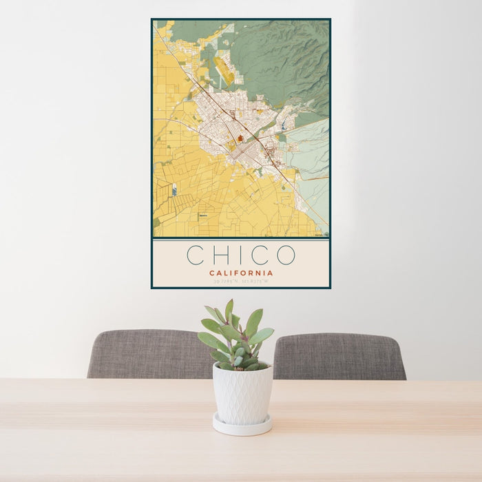 24x36 Chico California Map Print Portrait Orientation in Woodblock Style Behind 2 Chairs Table and Potted Plant