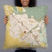 Person holding 22x22 Custom Chico California Map Throw Pillow in Woodblock