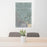 24x36 Chino California Map Print Portrait Orientation in Afternoon Style Behind 2 Chairs Table and Potted Plant