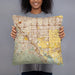 Person holding 18x18 Custom Chino California Map Throw Pillow in Woodblock