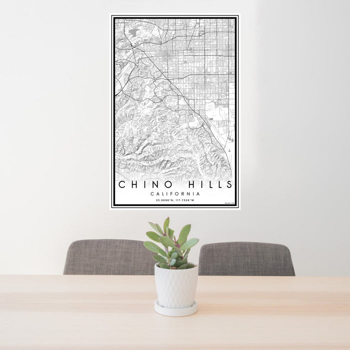 24x36 Chino Hills California Map Print Portrait Orientation in Classic Style Behind 2 Chairs Table and Potted Plant